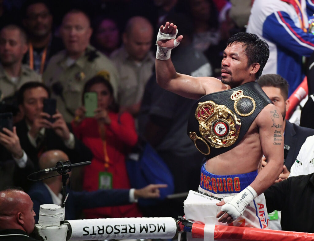 Manny Pacquiao celebrates after his WBA title fight win against Keith Thurman in 2019