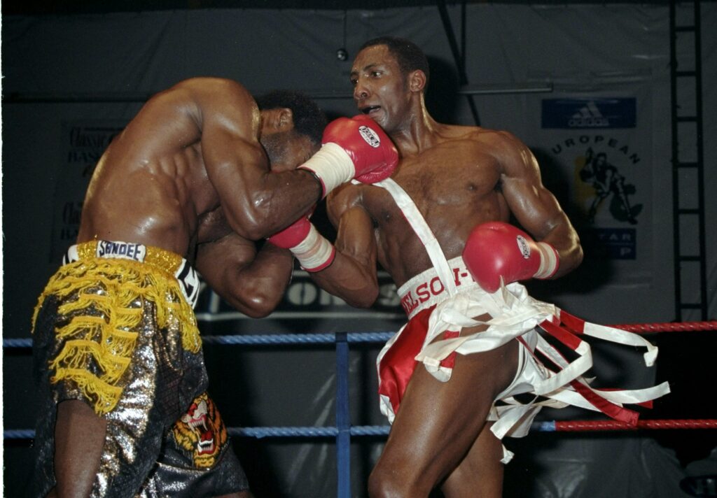 Johnny Nelson punches Carl Thompson during his cruiserweight title win in Derby in 1999