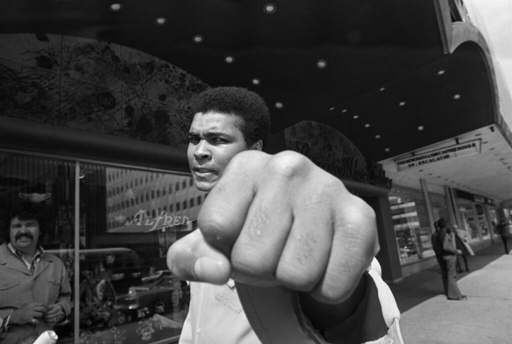 Muhammad Ali balls up his first for the camera during an interview in Philadelphia